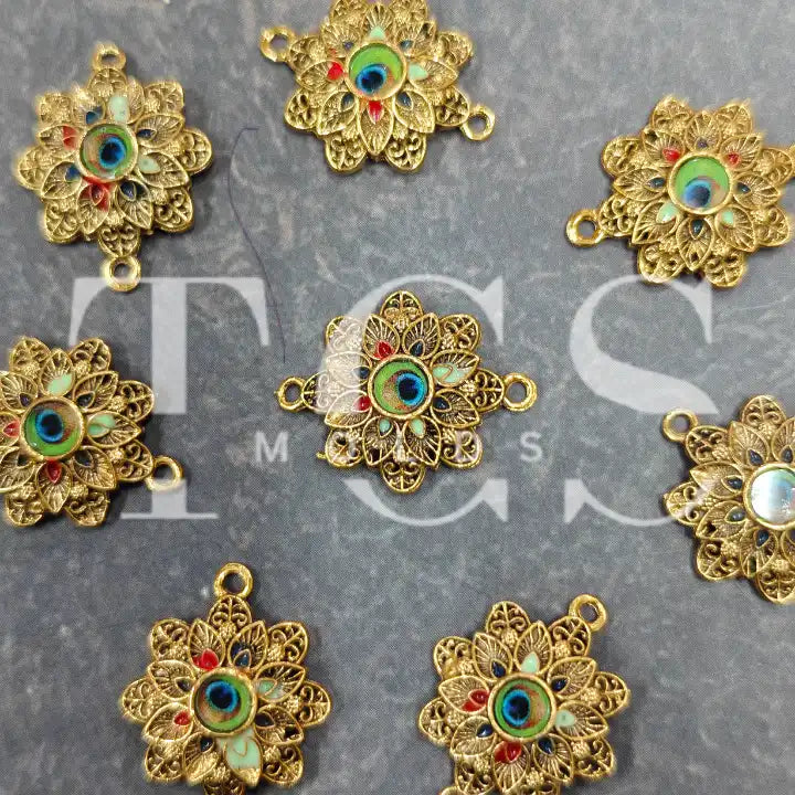 Rakhi charm 18 (per pc)