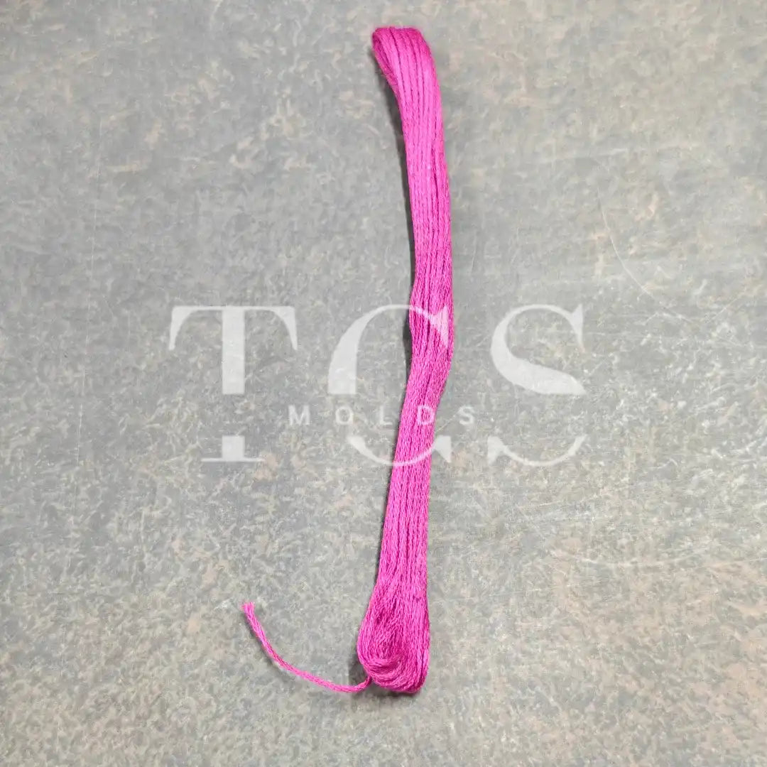 Magenta pink cotton thread
