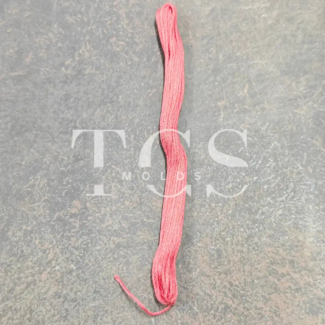 Peach pink cotton thread